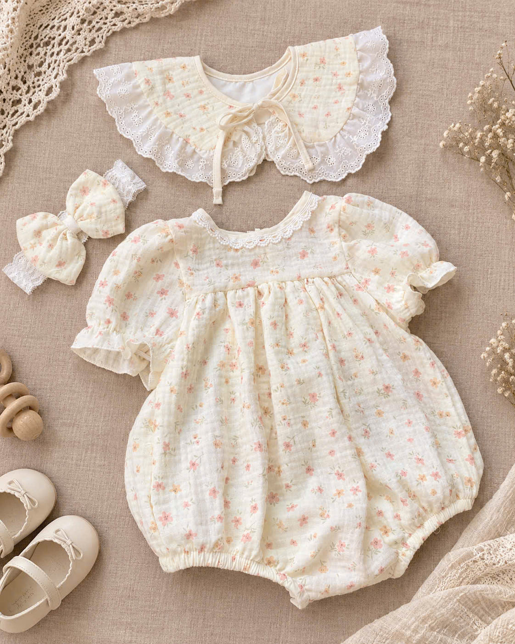 Floral Meadow Muslin Baby Romper Set Newborn–12 Months | Baby Girl Cotton Muslin Romper with Detachable Lace Bib & Matching Bow Headband