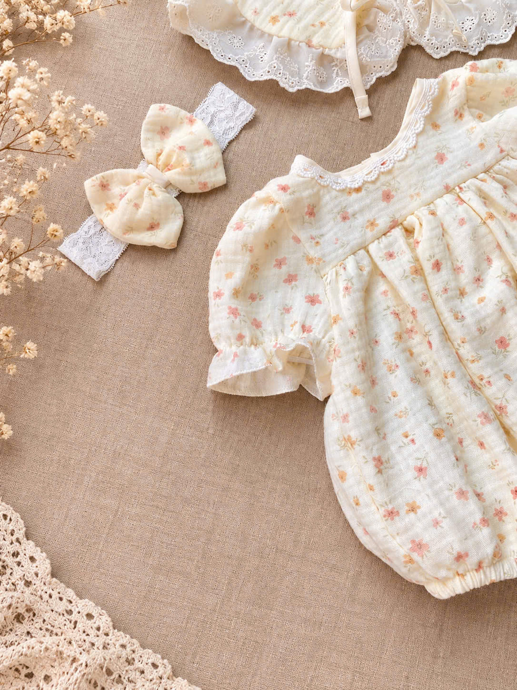 Floral Meadow Muslin Baby Romper Set Newborn–12 Months | Baby Girl Cotton Muslin Romper with Detachable Lace Bib & Matching Bow Headband