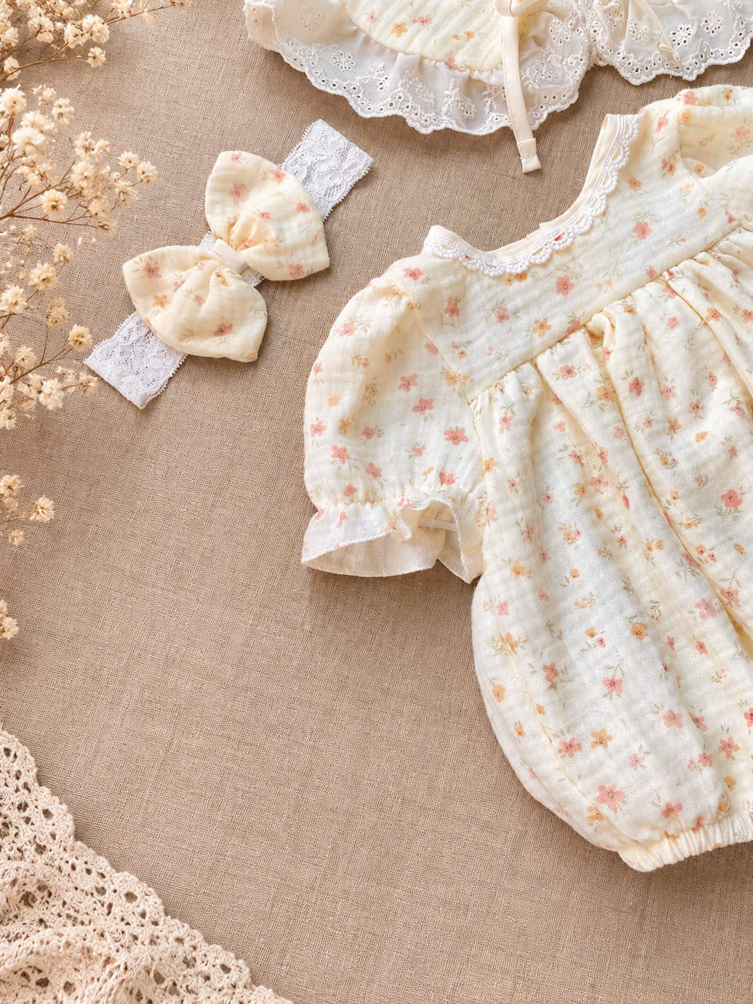 Floral Meadow Muslin Baby Romper Set Newborn–12 Months | Baby Girl Cotton Muslin Romper with Detachable Lace Bib & Matching Bow Headband