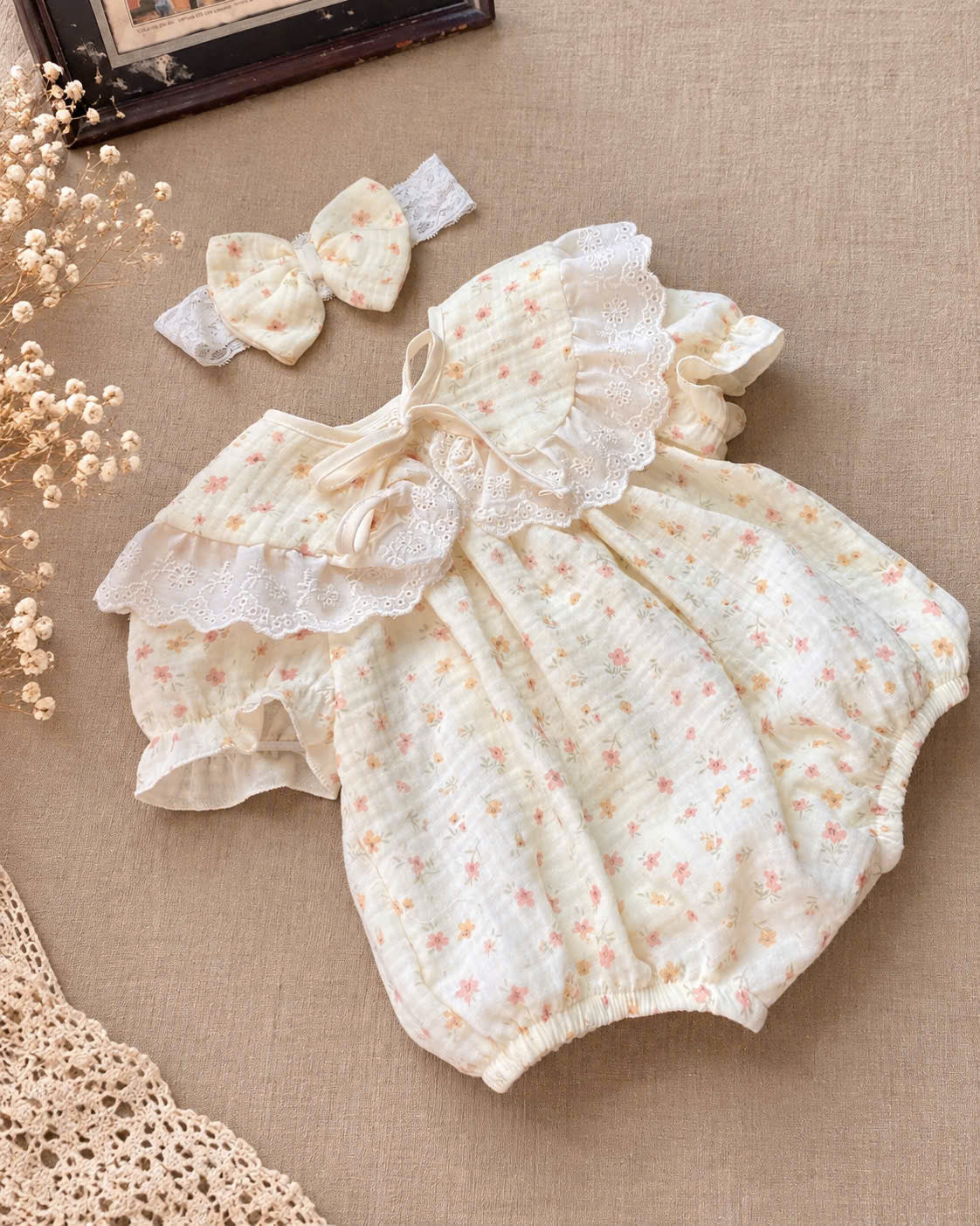 Floral Meadow Muslin Baby Romper Set Newborn–12 Months | Baby Girl Cotton Muslin Romper with Detachable Lace Bib & Matching Bow Headband