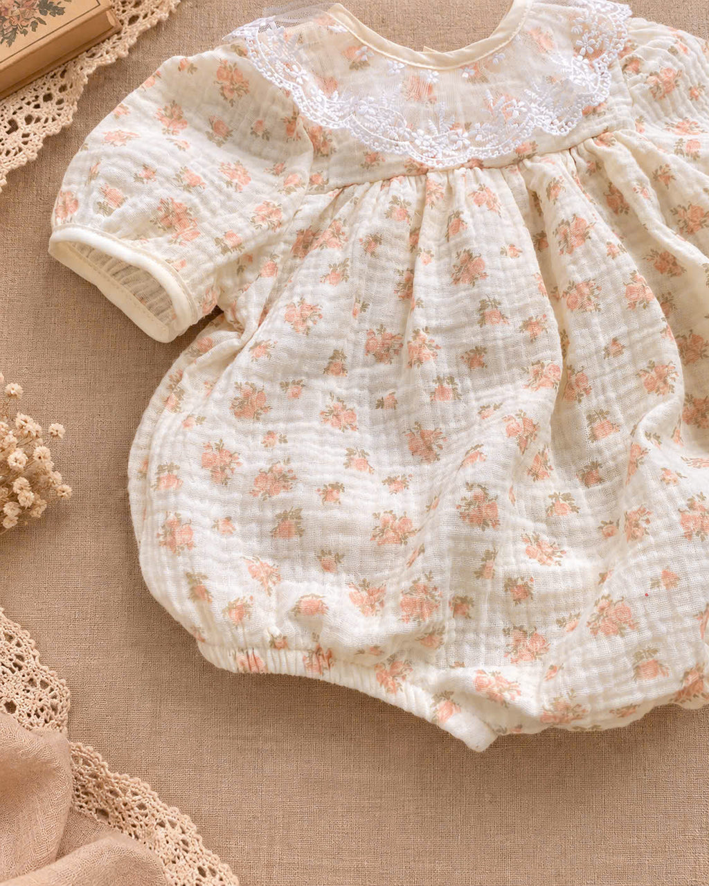 Peach Blossom Muslin Babydoll Romper Newborn–12 Months | Baby Girl Floral Cotton Muslin Romper with Lace Collar & Matching Headband
